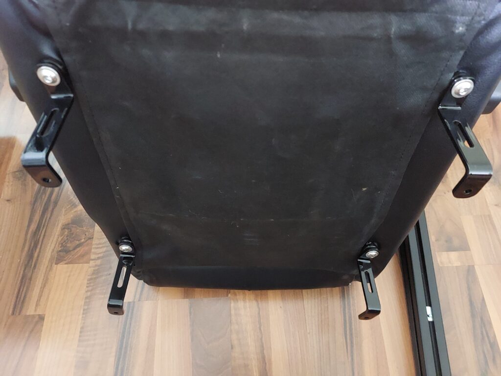 Seat adapters attached to underside of seat